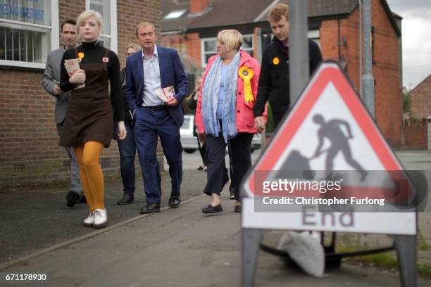 Liberal Democrat party leader, Tim Farron cavasses on the streets after launching the party's general election campaign on April 21, 2017 in...