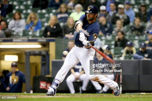 Kirk Nieuwenhuis of the Milwaukee Brewers hits a double in the eighth inning against the St. Louis Cardinals at Miller Park on April 20, 2017 in...