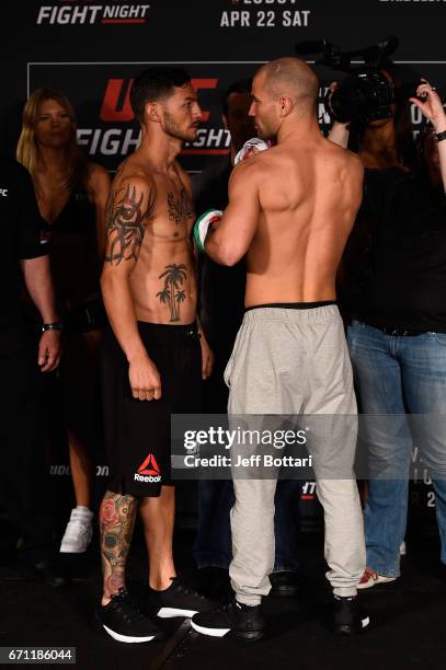 Cub Swanson and Artem Lobov of Russia face off during the UFC Fight Night weigh-in at the Sheraton Music City Hotel on April 21, 2017 in Nashville,...