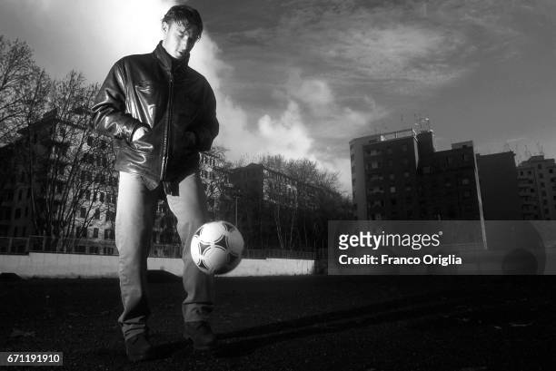 Italian football player Francesco Totti juggles the ball on the pitch where he started to play football as a child as he poses for La Gazzetta dello...