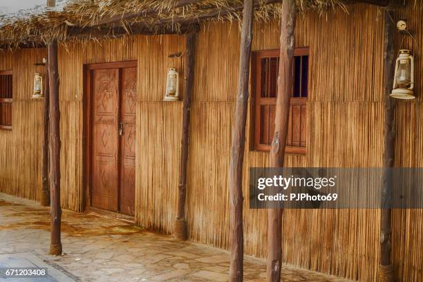 old wooden house in dubai - bastakiah neighbourhood - al fahidi fort stock pictures, royalty-free photos & images