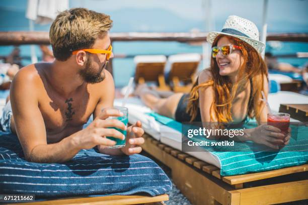 summer romance - deckchair stock pictures, royalty-free photos & images