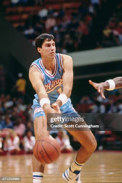 Randy Wittman of the Sacramento Kings passes the ball against the Atlanta Hawks during a game played circa 1990 at the Omni in Atlanta, Georgia. NOTE...