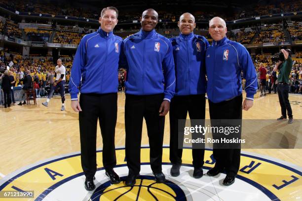 Referees, Tony Brown, Ron Garretsona and Dan Crawford pose for a photo before Game Three of the Eastern Conference Quarterfinals between the...