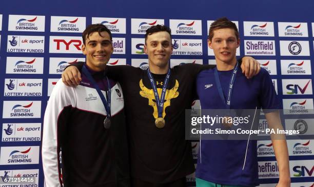 James Guy gold medalist in the Men's Open 100m Butterfly Final , second placed Adam Barrett and bronze medalist Duncan Scott during day four of the...