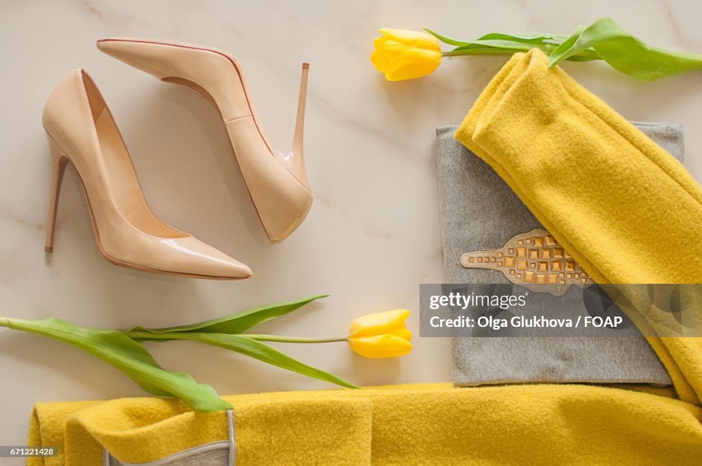 Female accessory with yellow flowers