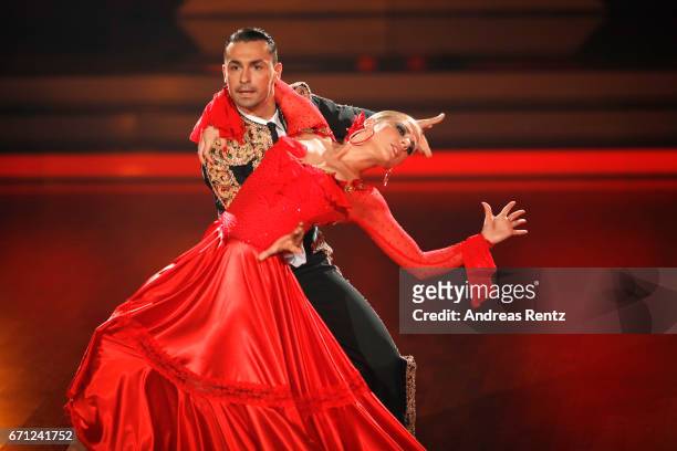 Cheyenne Pahde and Andrzej Cibis perform on stage during the 5th show of the tenth season of the television competition 'Let's Dance' on April 21,...