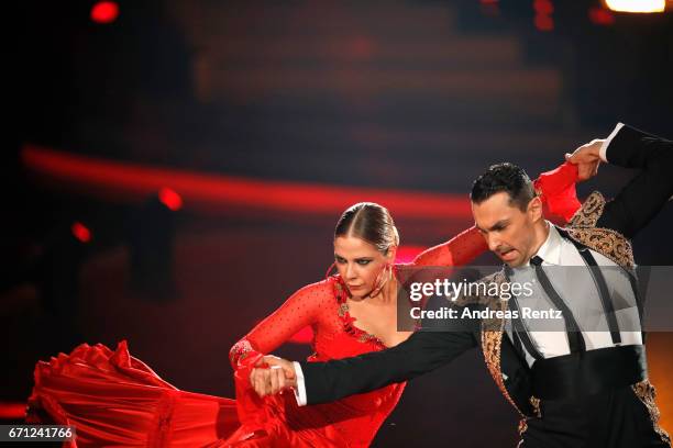 Cheyenne Pahde and Andrzej Cibis perform on stage during the 5th show of the tenth season of the television competition 'Let's Dance' on April 21,...