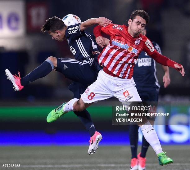 Nancy's French midfielder Vincent Marchetti vies for the ball with Olympique de Marseille's French midfielder Maxime Lopez during the French L1...
