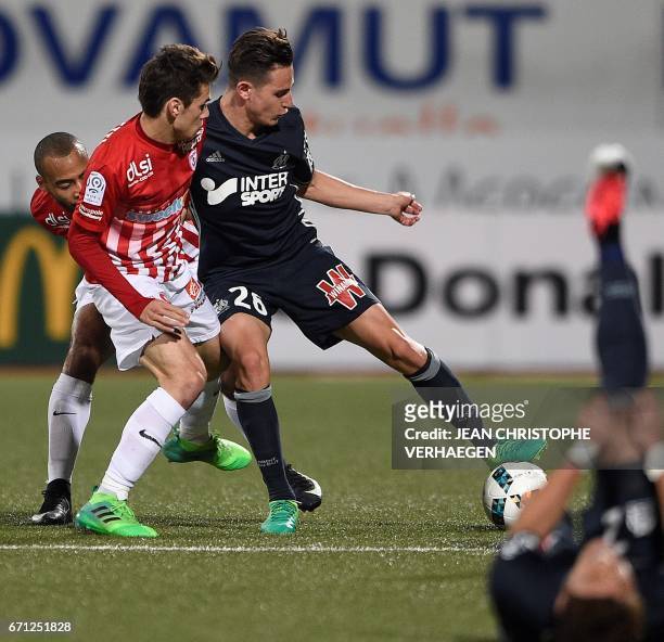 Nancy's French midfielder Vincent Marchetti vies for the ball with Olympique de Marseille's French forward Antoine Rabillard during the French L1...