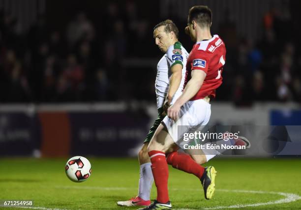 Dublin , Ireland - 21 April 2017; Karl Sheppard of Cork City on his way to his side's second goal despite the attempts of Michael Barker of St....