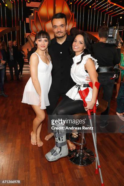 Giovanni Zarrella with injured dance partner Christina Luft and Marta Arndt pose after the 5th show of the tenth season of the television competition...