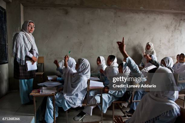 Afghan Hazara students attend the Marefat School on the outskirts of Kabul, Afghanistan, April 10, 2010. Until 2006, the school was co-ed, and in...