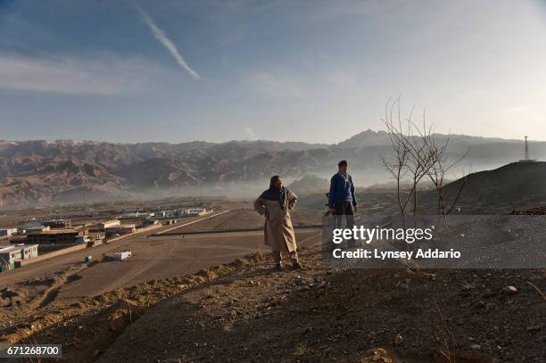 Habiba Sarabi of Bamian Province, the only female governor in Afghanistan, takes her morning walk in the hills, security officer in tow. Bamian...