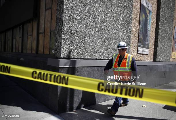 Pacific Gas and Electric worker walks outside of an electric substation where a fire occured and caused a citywide power outage on April 21, 2017 in...