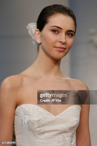 Model walks the runway at the Monique Lhuillier Spring 2018 Bridal show at Carnegie Hall on April 21, 2017 in New York City.