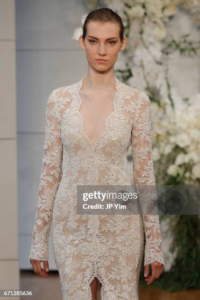 Model walks the runway at the Monique Lhuillier Spring 2018 Bridal show at Carnegie Hall on April 21, 2017 in New York City.