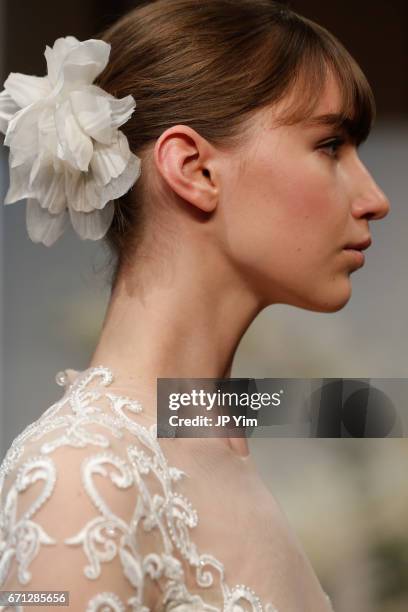 Model walks the runway at the Monique Lhuillier Spring 2018 Bridal show at Carnegie Hall on April 21, 2017 in New York City.