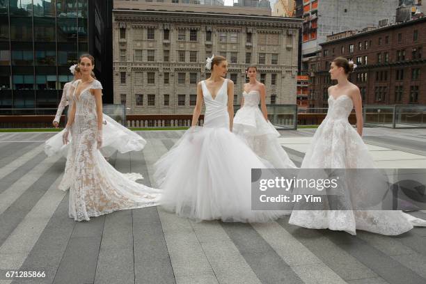 Models pose prior to the Monique Lhuillier Spring 2018 Bridal show at Carnegie Hall on April 21, 2017 in New York City.