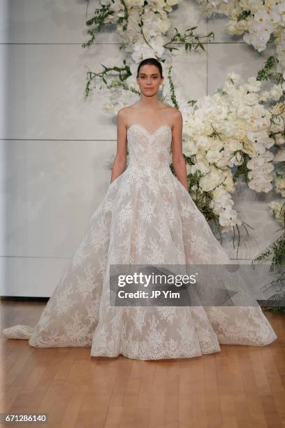 Model walks the runway at the Monique Lhuillier Spring 2018 Bridal show at Carnegie Hall on April 21, 2017 in New York City.
