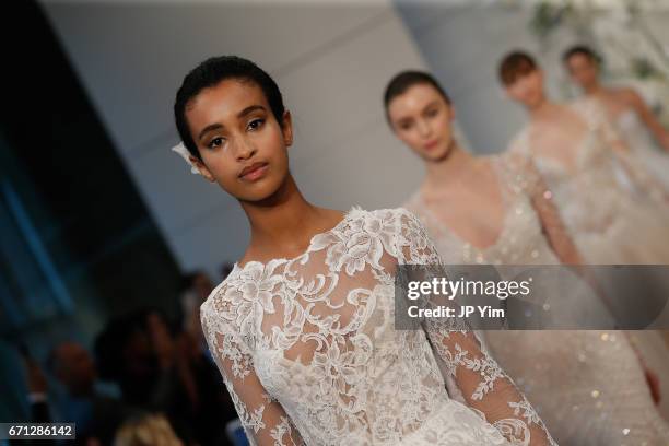 Models walk the runway at the Monique Lhuillier Spring 2018 Bridal show at Carnegie Hall on April 21, 2017 in New York City.