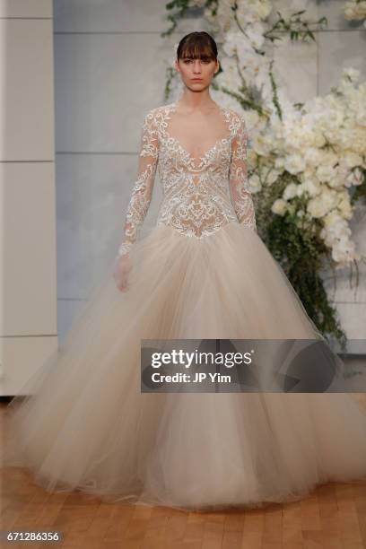 Model walks the runway at the Monique Lhuillier Spring 2018 Bridal show at Carnegie Hall on April 21, 2017 in New York City.