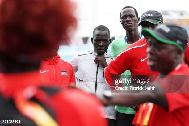 Gai Nyang Tap and Dominic Lokinyomo Lobalu of the Athlete Refugee Team speak to team Kenya during practice prior to the IAAF / BTC World Relays...