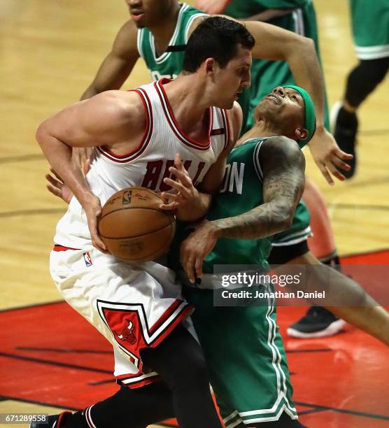 Isaiah Thomas of the Boston Celtics fouls Paul Zipser of the Chicago Bulls during Game Three of the Eastern Conference Quarterfinals during the 2017...