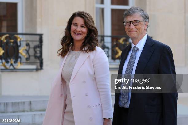 Bill and Melinda Gates arrive at the Elysee Palace before receiving the award of Commander of the Legion of Honor by French President Francois...