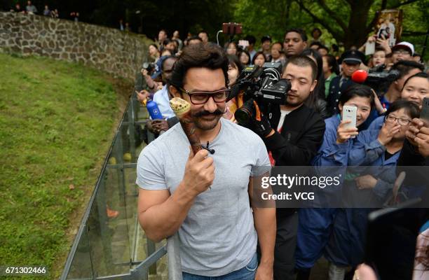 Bollywood actor Aamir Khan visits the Dujiangyan base of the China Conservation and Research Center for Giant Pandas on April 20, 2017 in Chengdu,...