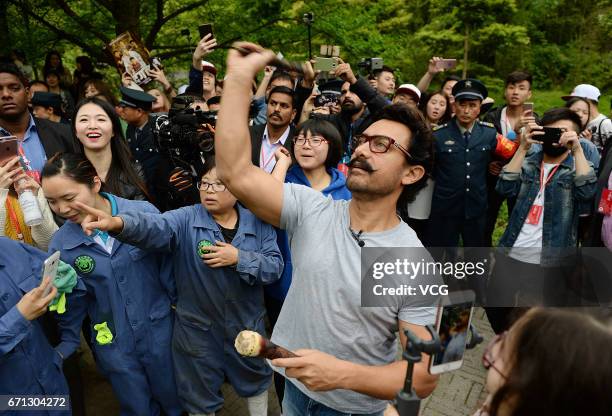 Bollywood actor Aamir Khan visits the Dujiangyan base of the China Conservation and Research Center for Giant Pandas on April 20, 2017 in Chengdu,...