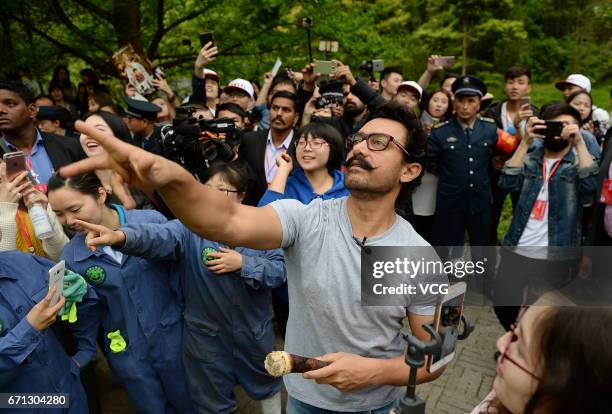 Bollywood actor Aamir Khan visits the Dujiangyan base of the China Conservation and Research Center for Giant Pandas on April 20, 2017 in Chengdu,...