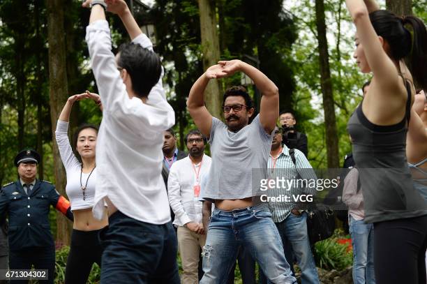 Bollywood actor Aamir Khan practices yoga at Mount Qingcheng on April 20, 2017 in Chengdu, China.
