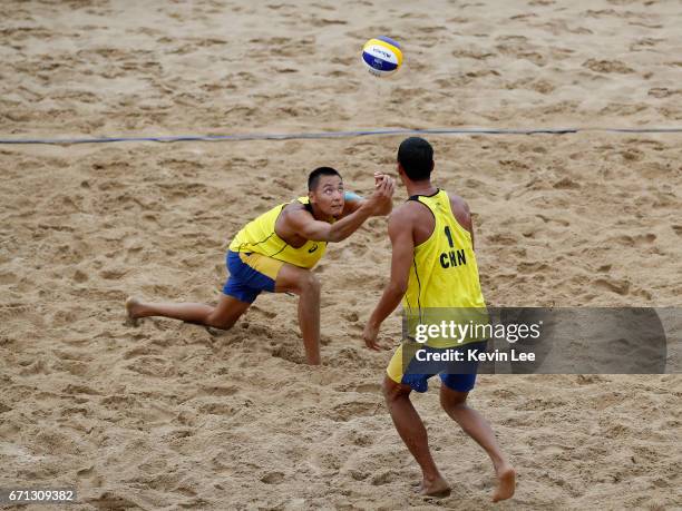 Chaowei Zhou and Zhuoxin Li of China in action at the FIVB Beach Volleyball World Tour Xiamen Open 2017 on April 21, 2017 in Xiamen, China.