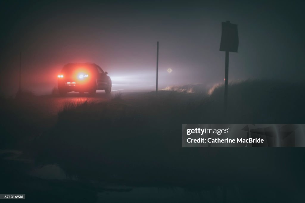 Driving in thick fog at night