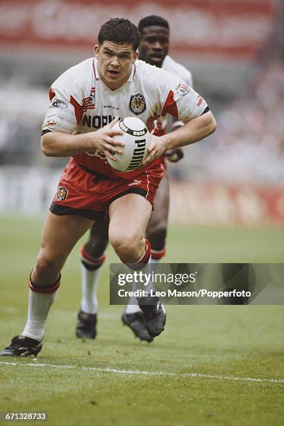 English rugby league player Andy Farrell of Wigan advances with the ball during the final of the 1995 Silk Cut Challenge Cup rugby league tournament...