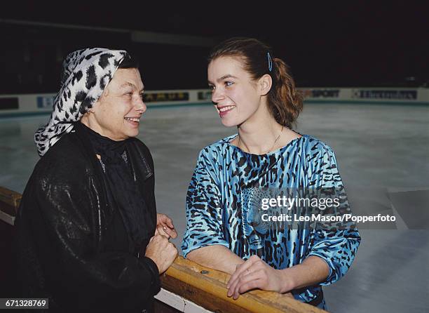 East German figure skater Katarina Witt pictured together with her coach Jutta Muller at the 1988 European Figure Skating Championships in Prague,...