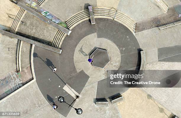 skateboarders at skatepark - drone pilot stock pictures, royalty-free photos & images