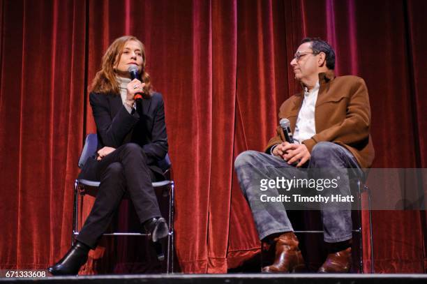 Isabelle Huppert and Michael Barker appear on Day 3 of Ebertfest 2017 on April 21, 2017 in Champaign, Illinois.