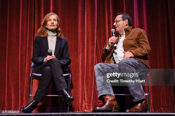 Isabelle Huppert and Michael Barker appear on Day 3 of Ebertfest 2017 on April 21, 2017 in Champaign, Illinois.