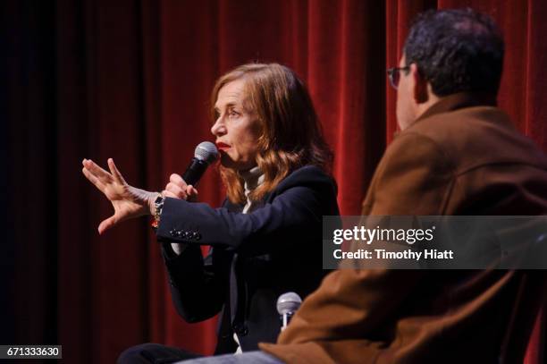 Isabelle Huppert and Michael Barker appear on Day 3 of Ebertfest 2017 on April 21, 2017 in Champaign, Illinois.