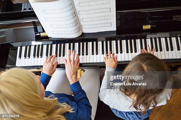 Black Kid Playing Piano Photos and Premium High Res Pictures - Getty Images