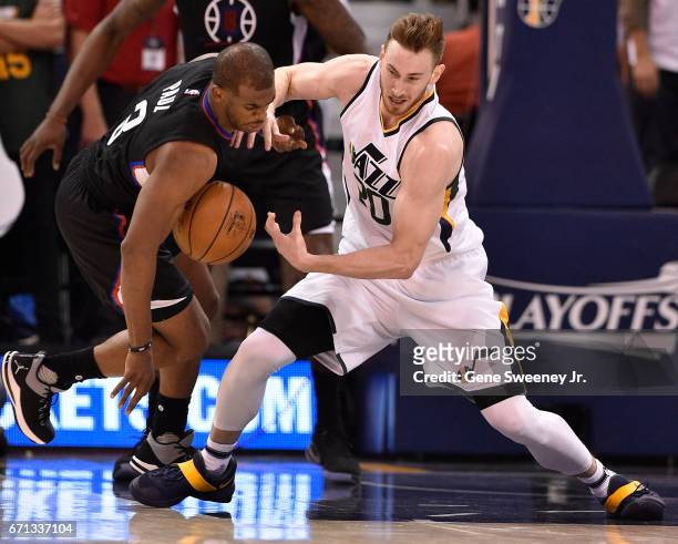 Chris Paul of the Los Angeles Clippers and Gordon Hayward of the Utah Jazz try for the loose ball in the second half of the 111-106 Clipper victory...