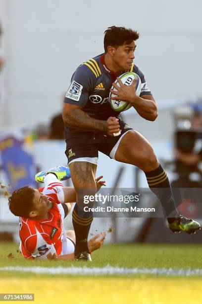 Malakai Fekitoa of the Highlanders makes a break during the round nine Super Rugby match between the Highlanders and the Sunwolves at Rugby Park...