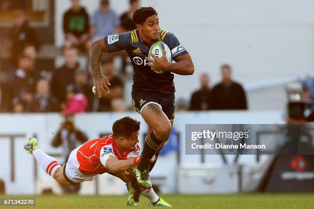 Malakai Fekitoa of the Highlanders makes a break during the round nine Super Rugby match between the Highlanders and the Sunwolves at Rugby Park...