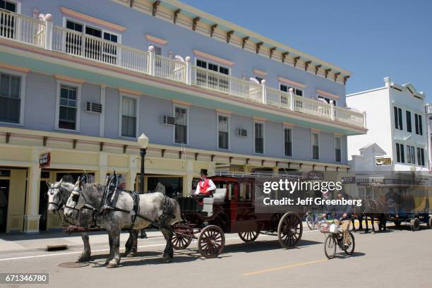 Horse-drawn carriage on Main Street.