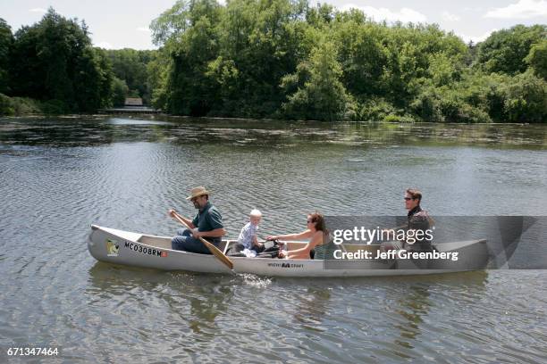 Family in a canoe on Huron River.
