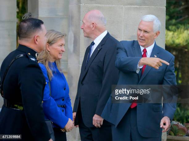 Vice President Mike Pence chats with a U.S. Marine as he and Australian Governor General Peter Cosgrove host a lunch reception for Australian and...