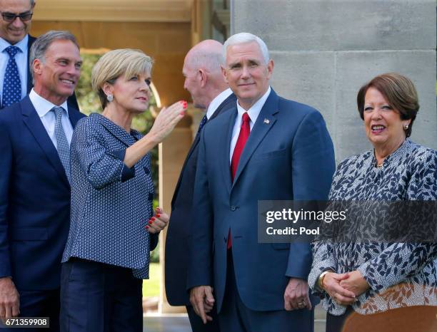 Vice President Mike Pence speaks with Australia's Foreign Minister Julie Bishop as Pence and Australian Governor General Peter Cosgrove host a lunch...