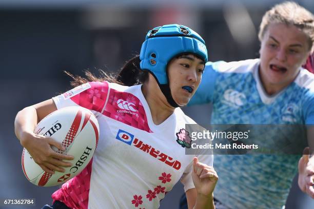Honoka Tsutsumi of Japan runs with the ball during the HSBC World Rugby Women's Sevens Series 2016/17 Kitakyushu pool match between Russia and Japan...